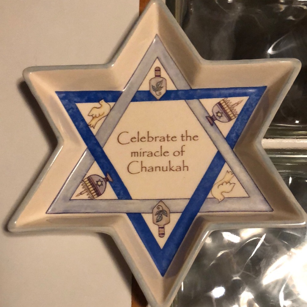 Star of David Hanukkah dish. Approximate 10 x 8“ with menorahs dreidels doves